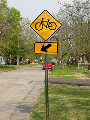 stockvault-bicycle-sign-along-street125202